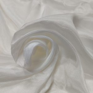Soft white Audi fabric with a lightweight sheer texture and elegant shine ideal for dresses, sarees, dupattas, and designer garments.