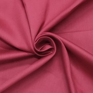 Soft Kiwi Cotton fabric with a smooth breathable texture ideal for kurtis, dresses, shirts, and casual wear.