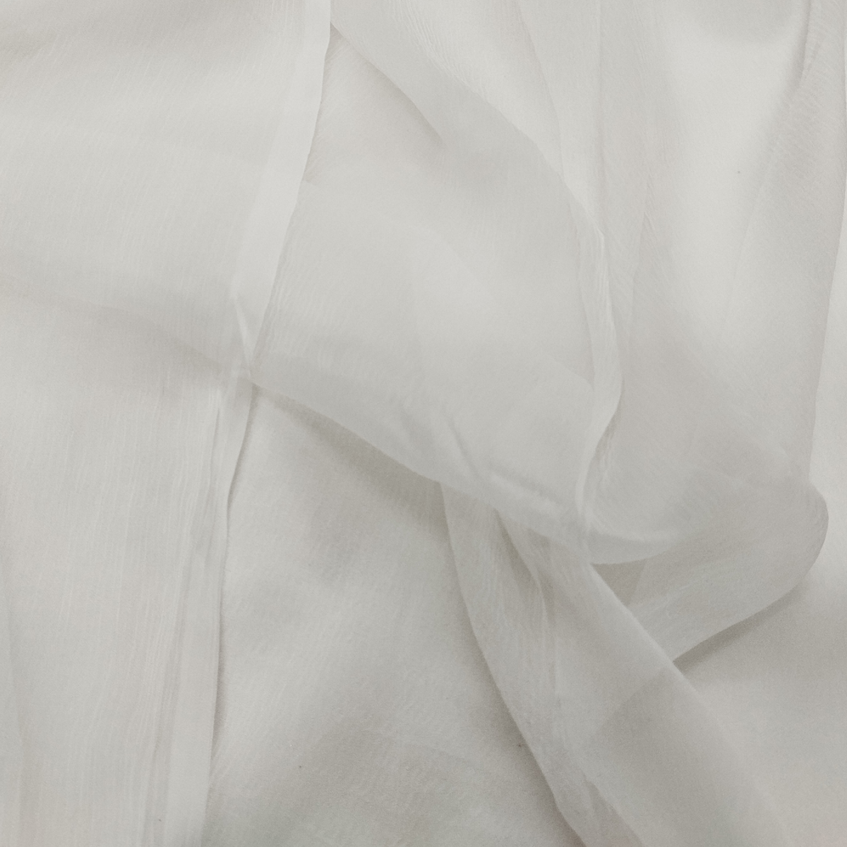 Soft white 30×30 dyeable chiffon fabric with transparent lightweight texture and elegant flowing drape