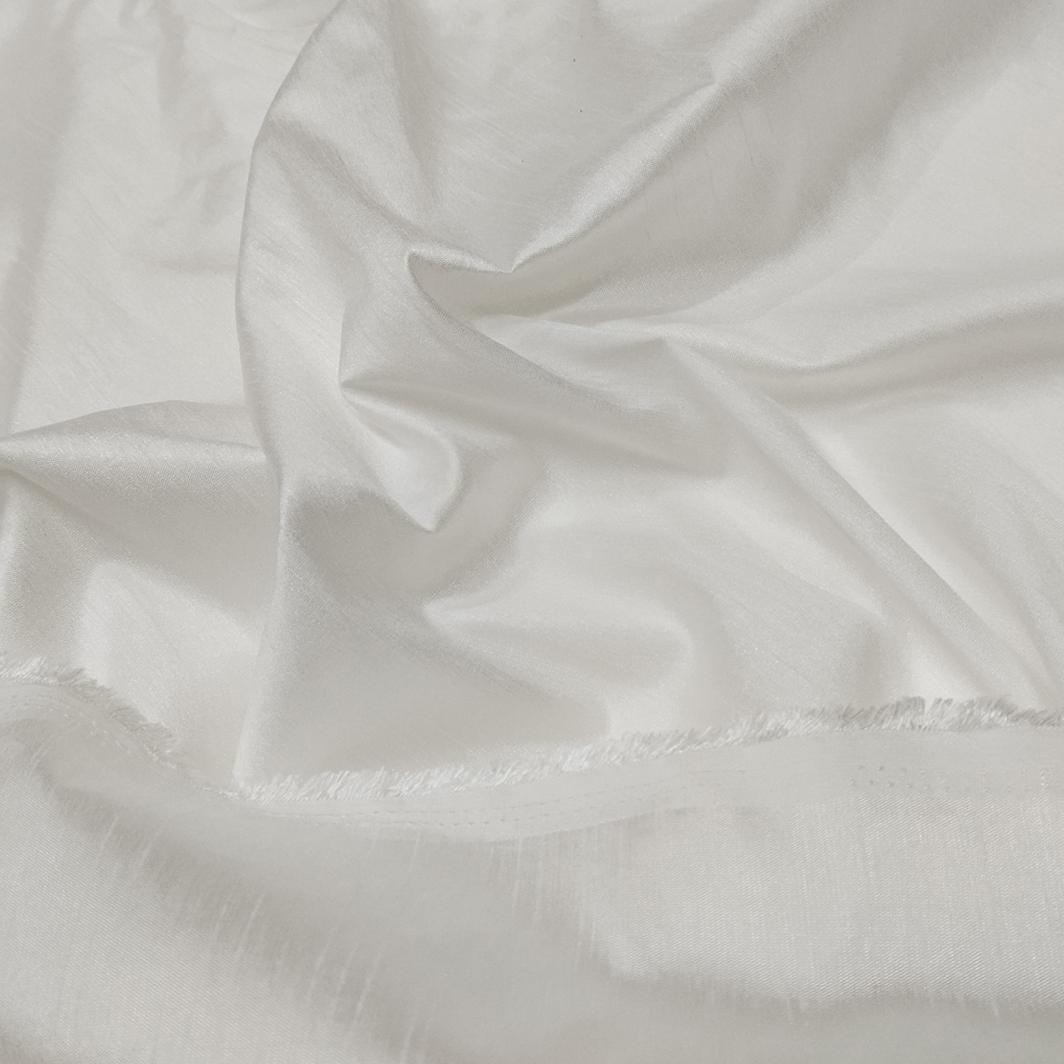 White Dupion fabric texture close-up
