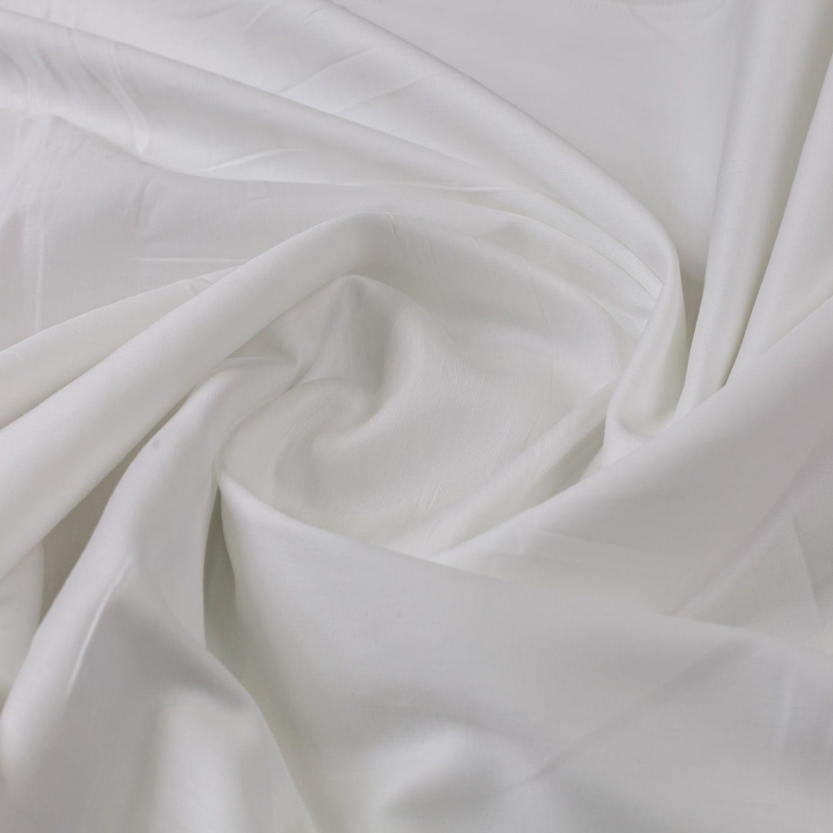 Soft malai cotton fabric with smooth flowing texture