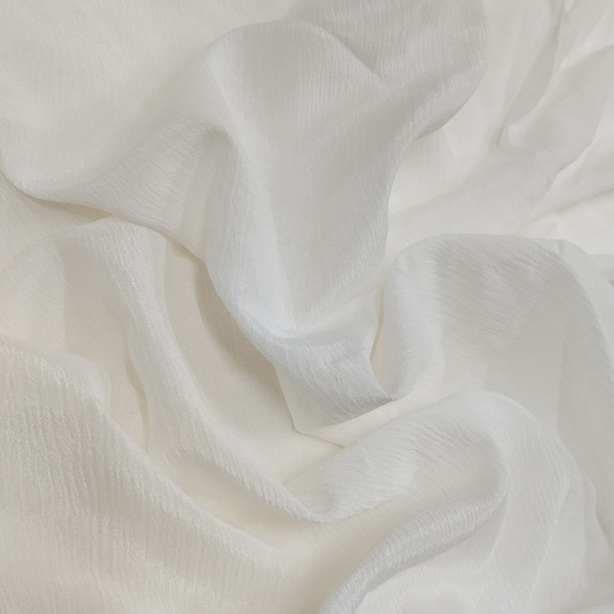 Mango Crush fabric with textured crushed pattern
