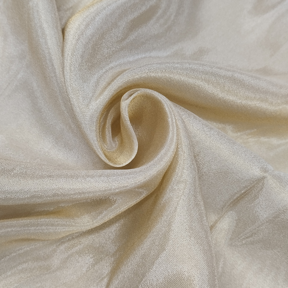 Soft shimmering tissue fabric for ethnic wear