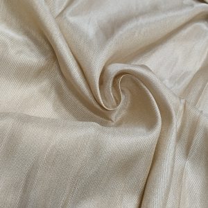 Elegant Pure Zari Silk fabric with rich woven zari detailing, lustrous finish, and luxurious drape for festive and bridal wear.