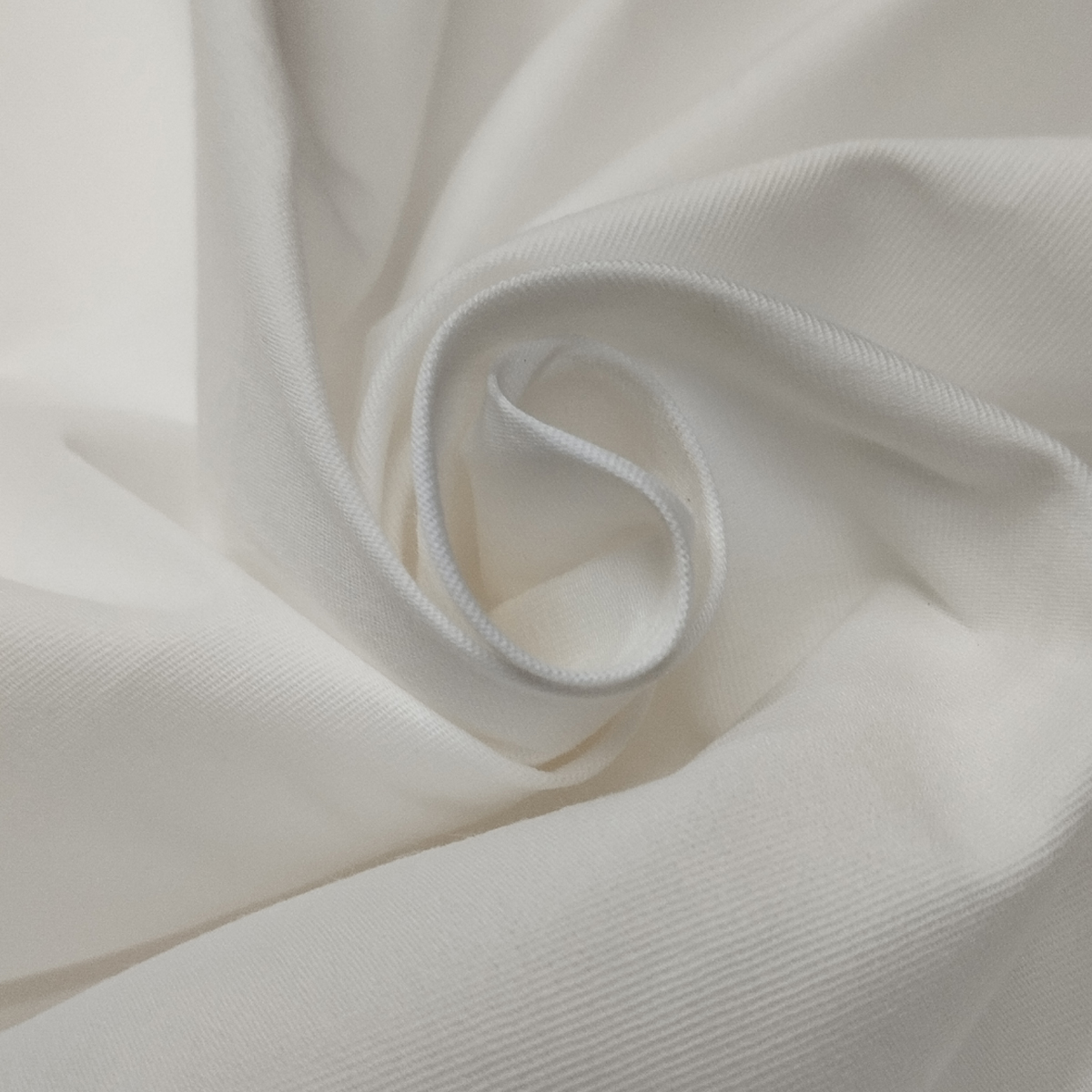 Soft Cotton Lycra fabric with breathable smooth texture and stretch finish for comfortable clothing.