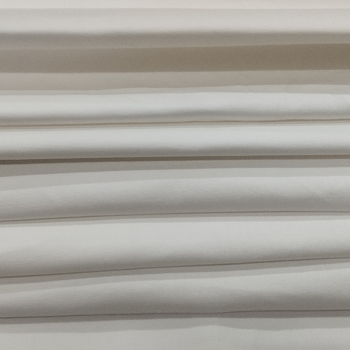 Soft Cotton Lycra fabric with breathable smooth texture and stretch finish for comfortable clothing