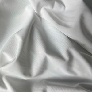White Balloon Lycra RFD fabric with smooth texture and 4-way stretch, suitable for dyeing and garment manufacturing