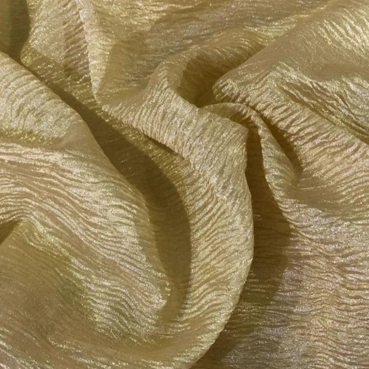 Pure Tissue Crush Fabric with a soft metallic sheen, textured crushed finish, and elegant drape suitable for festive and designer wear.
